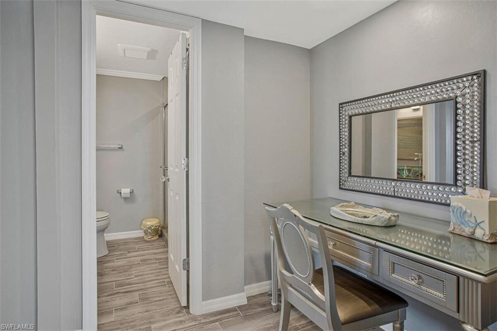 Bathroom with wood finish floors and vanity