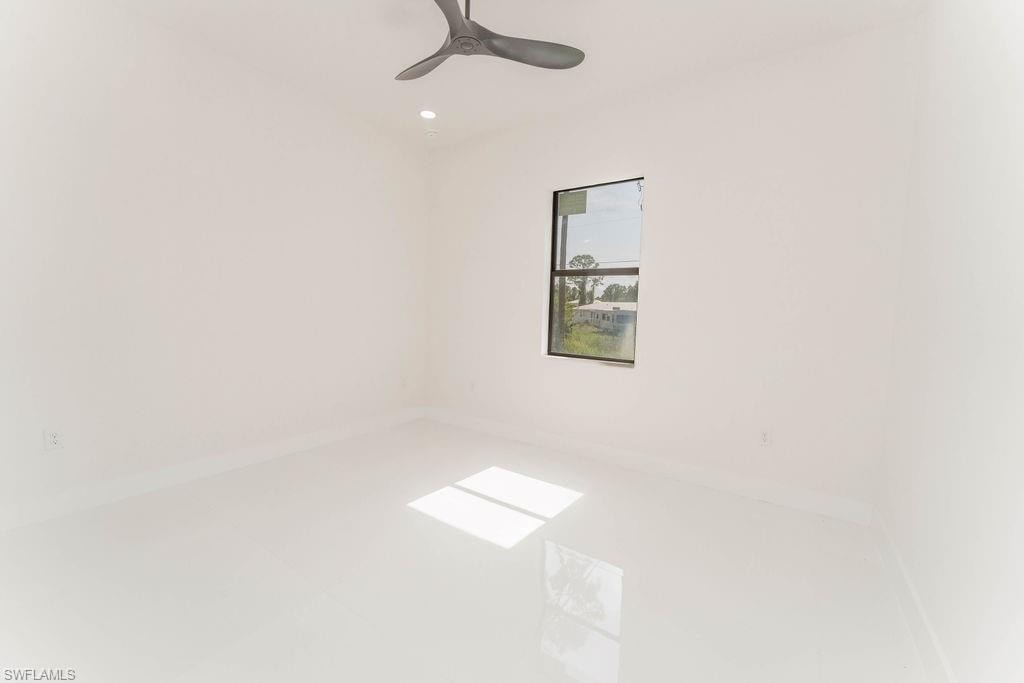 Spare room with recessed lighting and ceiling fan