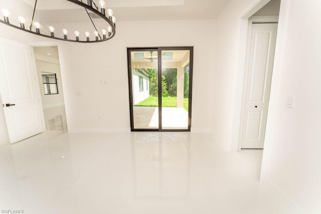 Unfurnished dining area with tile patterned flooring