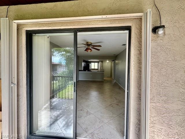 Sliders off Living Room w/Hurricane Shutters