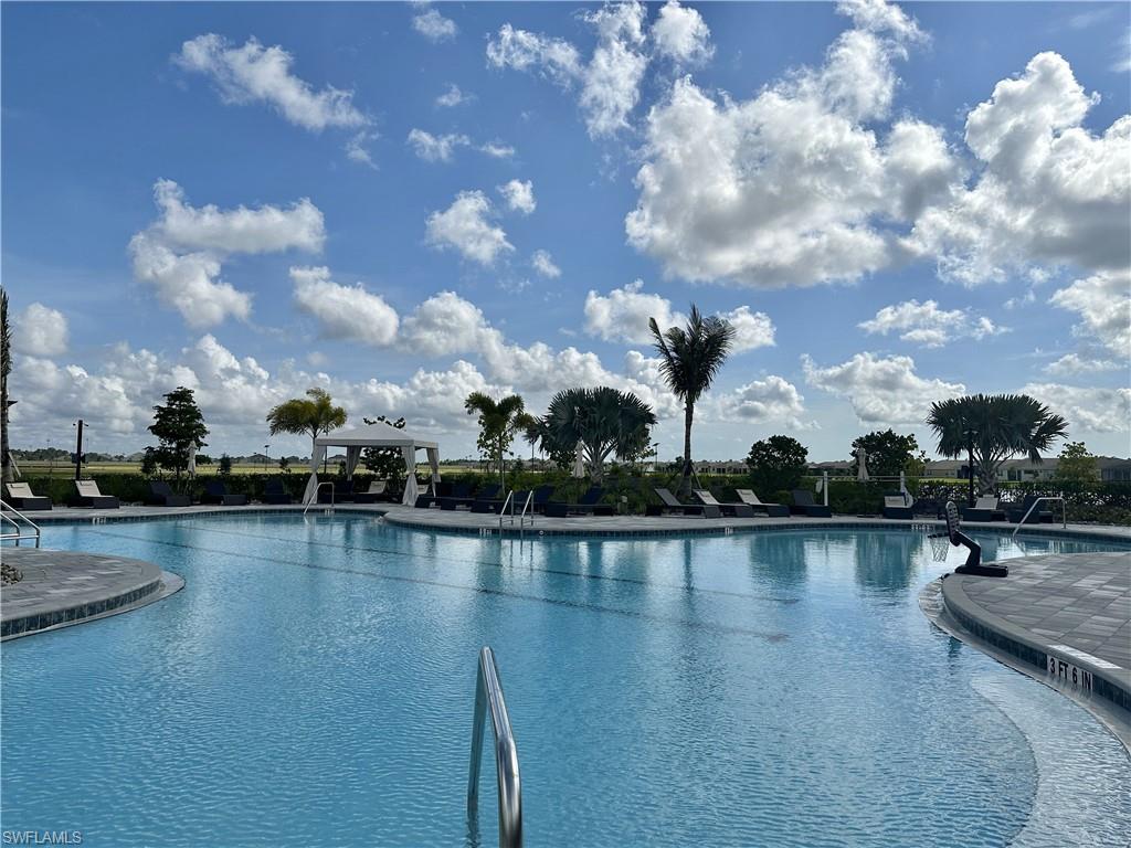 Community pool featuring a gazebo and a patio area