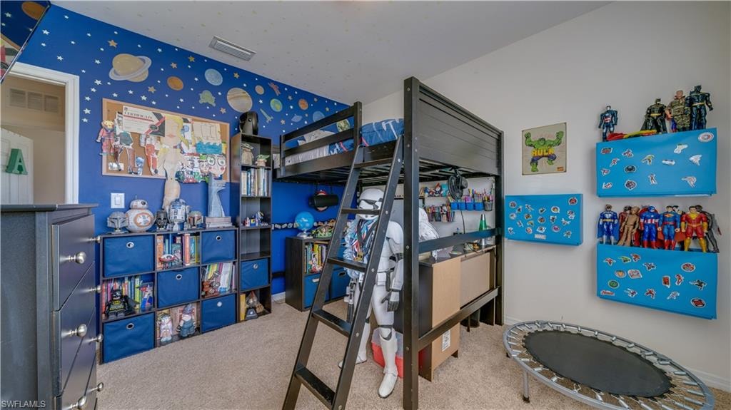 Bedroom with carpet flooring