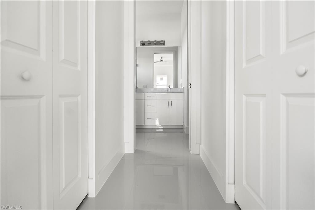 Hall featuring baseboards