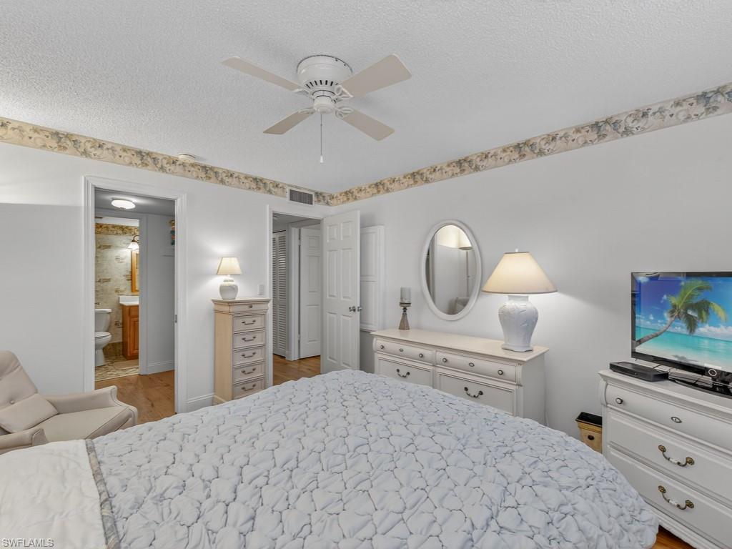 Primary Bedroom with Walk-In Closet and Ensuite Bathroom