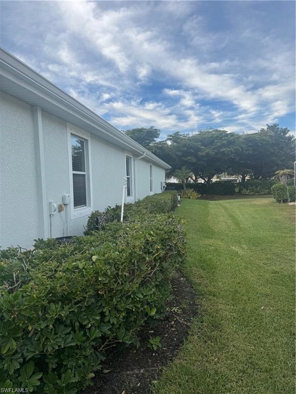 Side of house with new seamless gutters