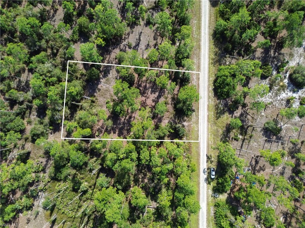 Aerial overview of property's location featuring property parcel outlined