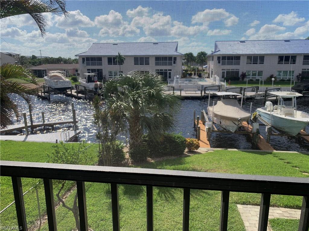 Water view with a boat dock