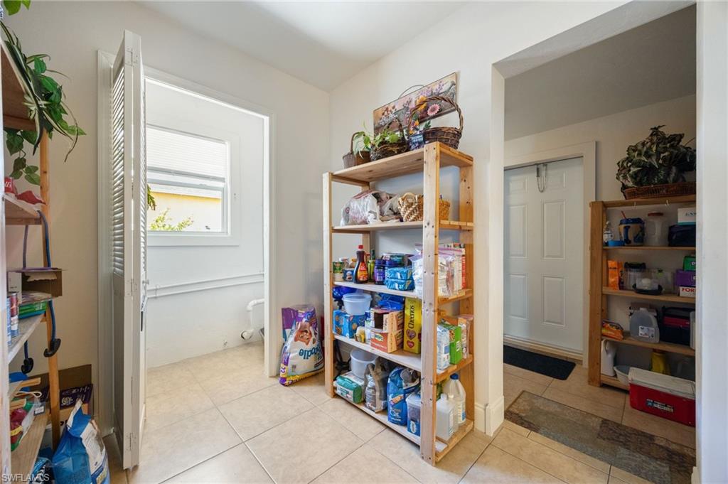 Rec room featuring light tile patterned flooring