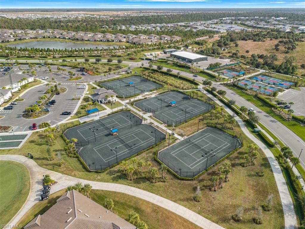 View of property location featuring nearby suburban area and a large body of water