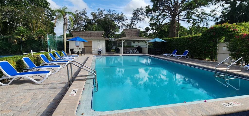 View of pool with a patio area