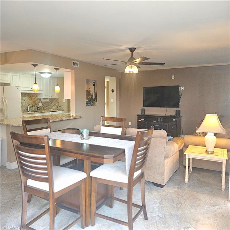 Dining room featuring a ceiling fan