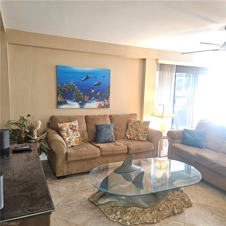 Living area with a ceiling fan