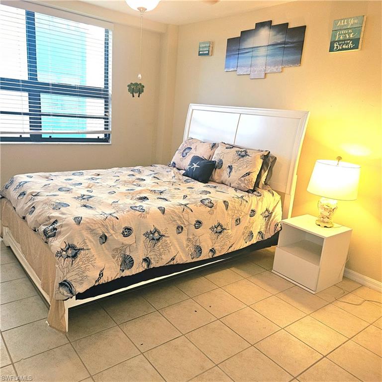 Bedroom featuring light tile patterned floors