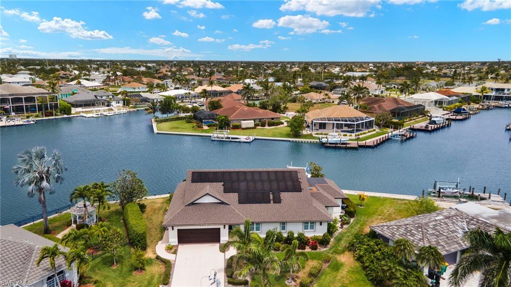 Aerial view of residential area with a nearby body of water