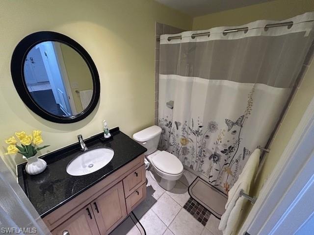 Full bath with vanity, a shower with curtain, and light tile patterned floors
