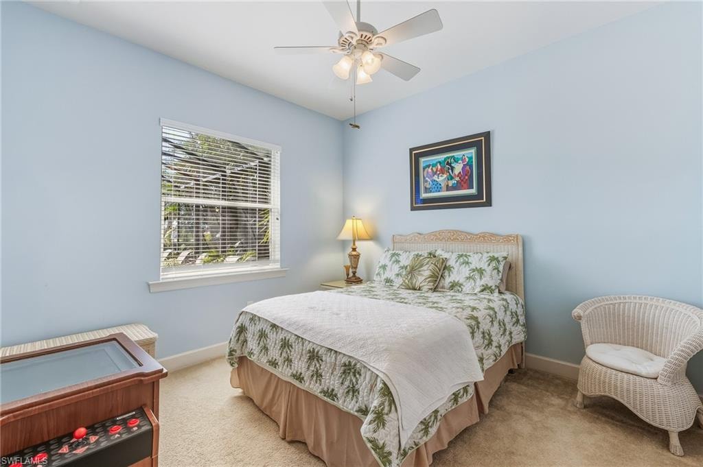 Rear guest bedroom overlooks pool/backyard.