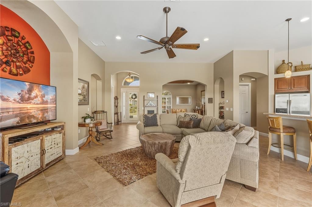 Open floorplan - living room and kitchen with the front door.