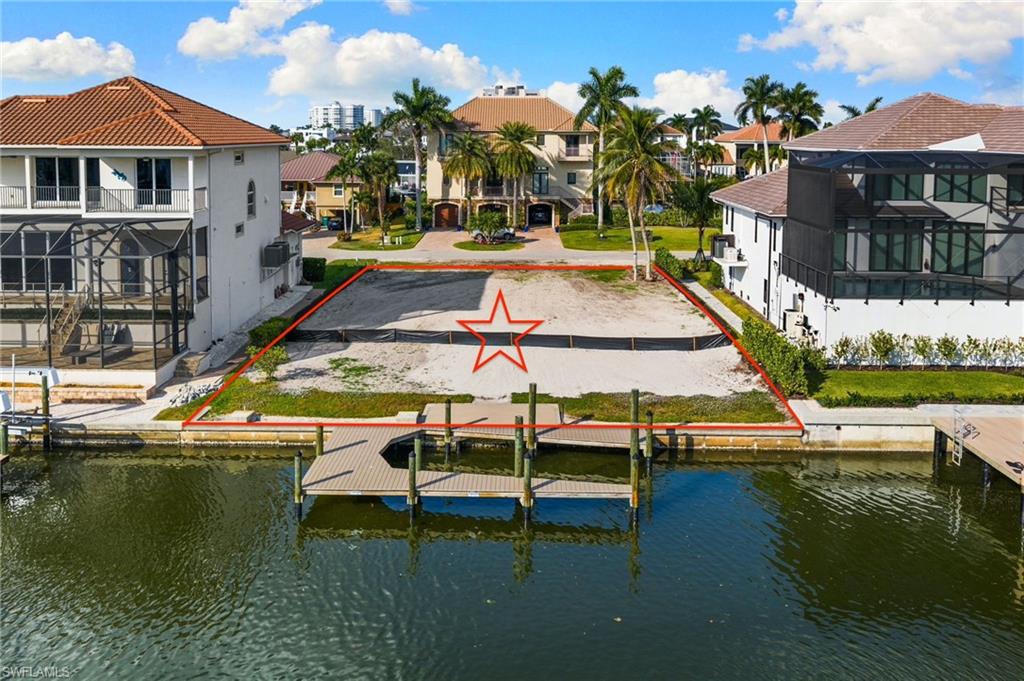 Drone footage of the dock and what would be the back of the home facing south.