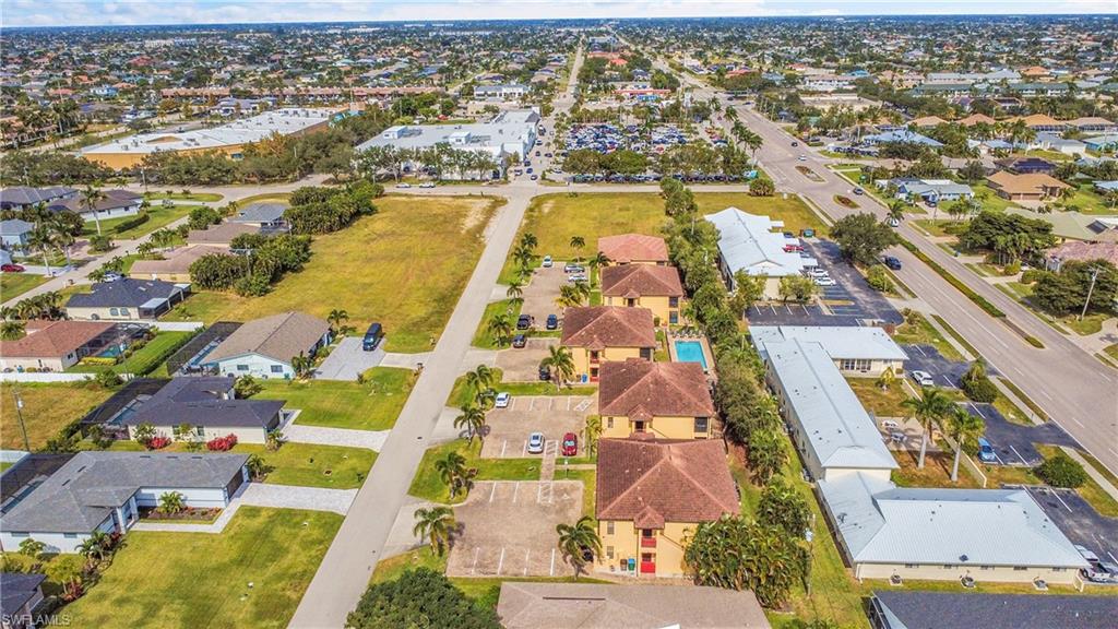 Aerial overview of property's location featuring nearby suburban area