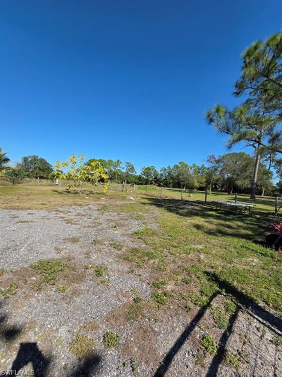 View of yard featuring a view of rural / pastoral area