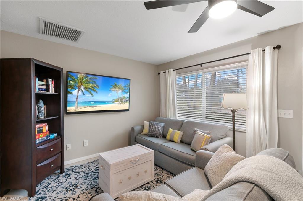Living area featuring baseboards