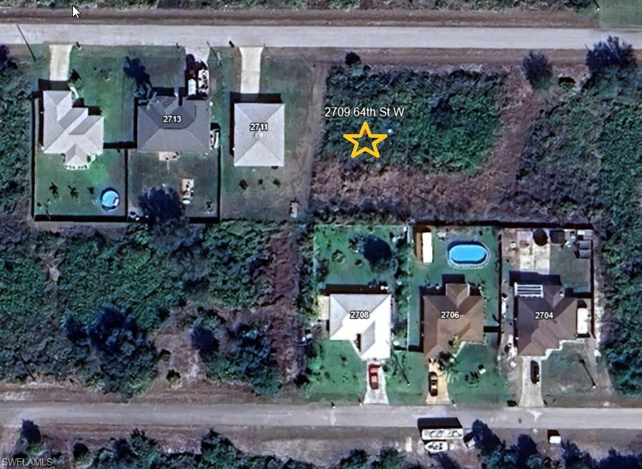 View of lot and surrounding properties