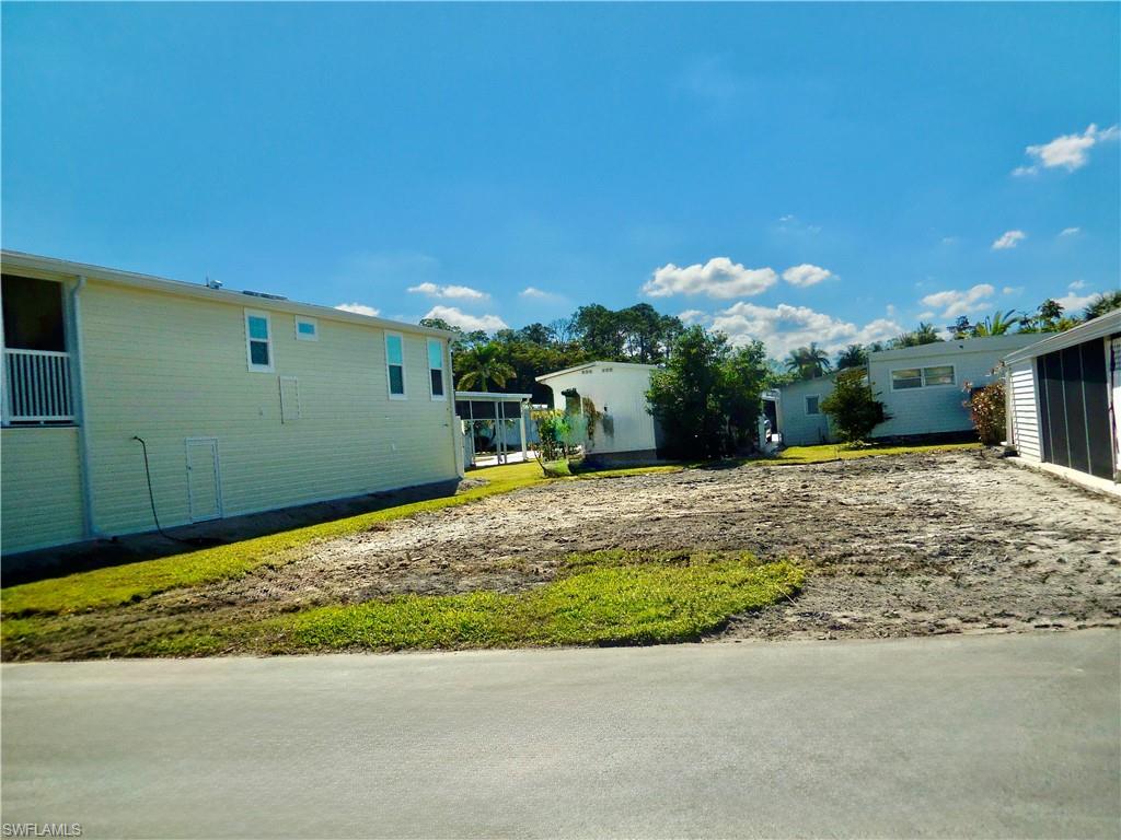 Homesite #26 next to new home on left.  Just down the street from amenities.