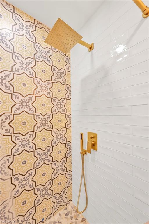 Full bathroom with a tile shower