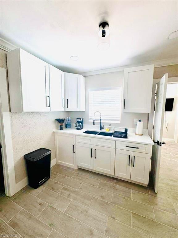 Kitchen with white cabinets