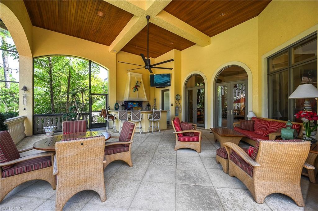 View of patio / terrace featuring a ceiling fan, french doors, and outdoor lounge area