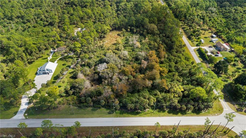 Drone / aerial view of a heavily wooded area