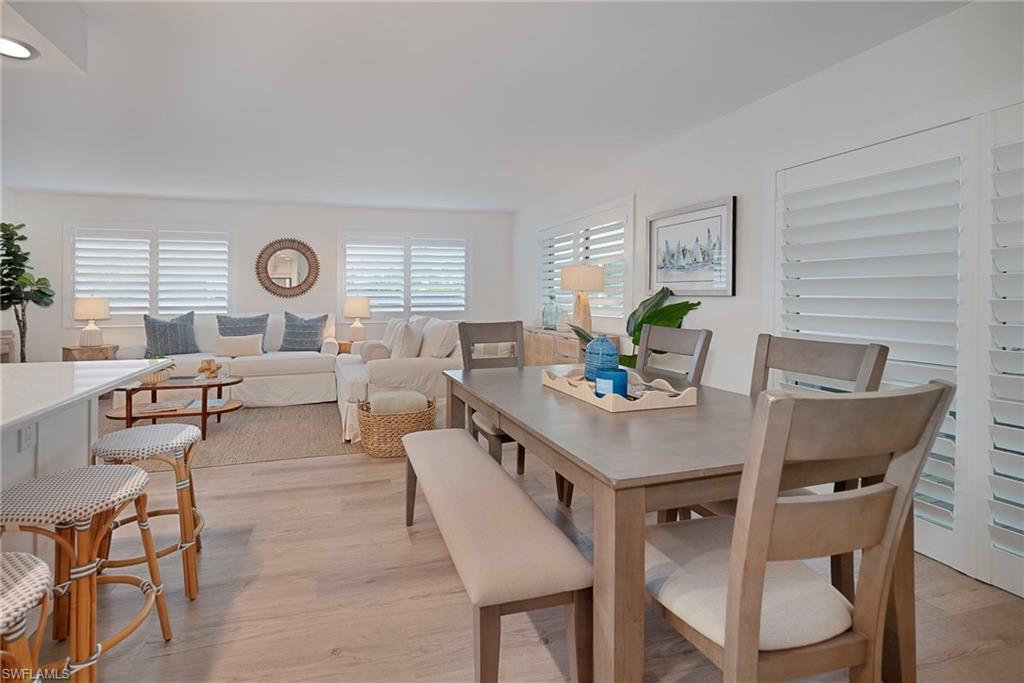 Dining area with light wood finished floors