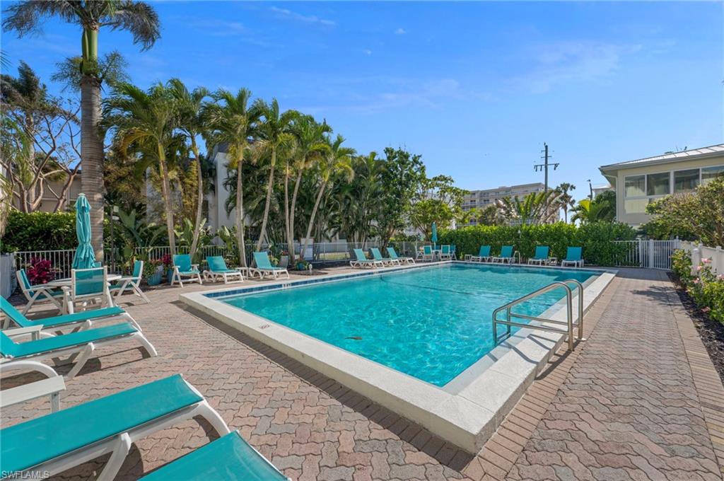 Community pool featuring a patio area