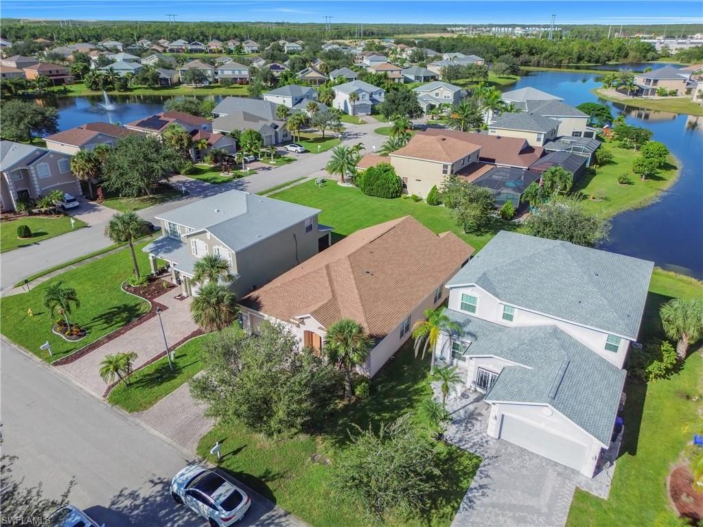 Aerial view of residential area with a nearby body of water
