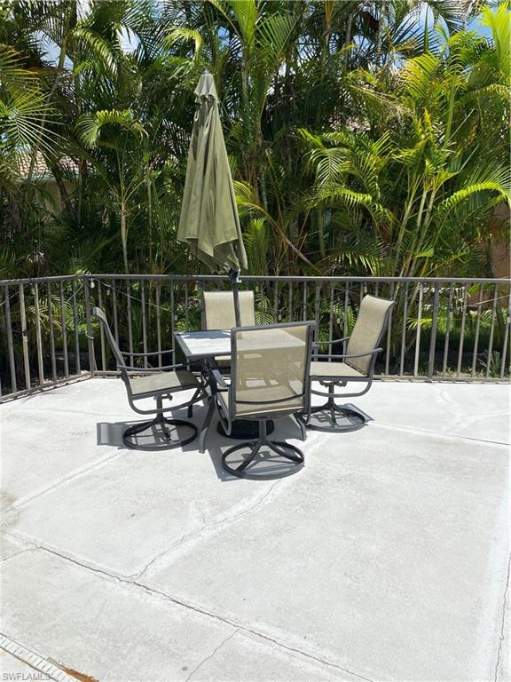 View of patio with outdoor dining space
