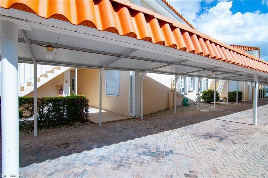 View of patio / terrace featuring stairway and a pergola