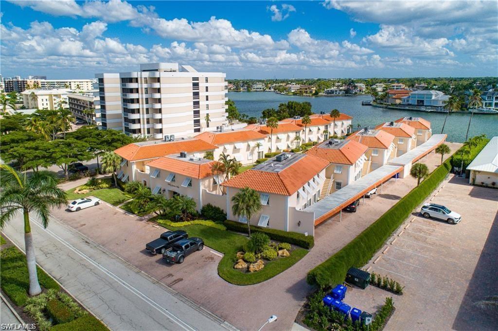 Bird's eye view of a large body of water and apartment complex