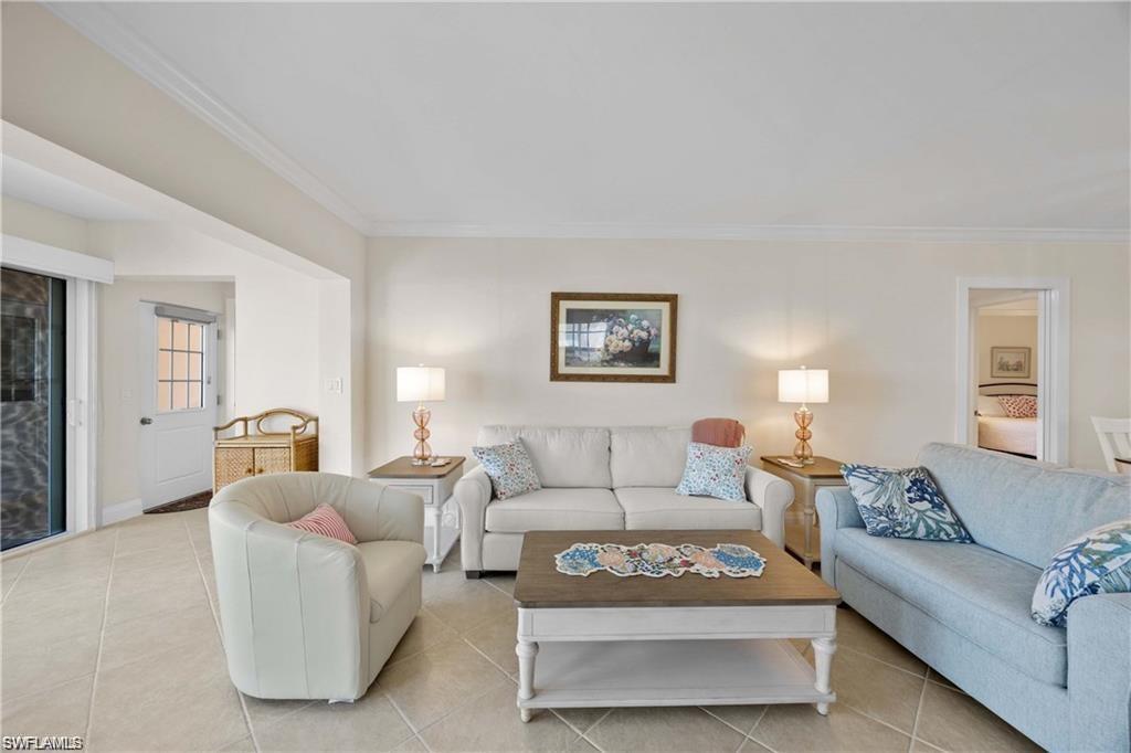 Tiled living room with ornamental molding