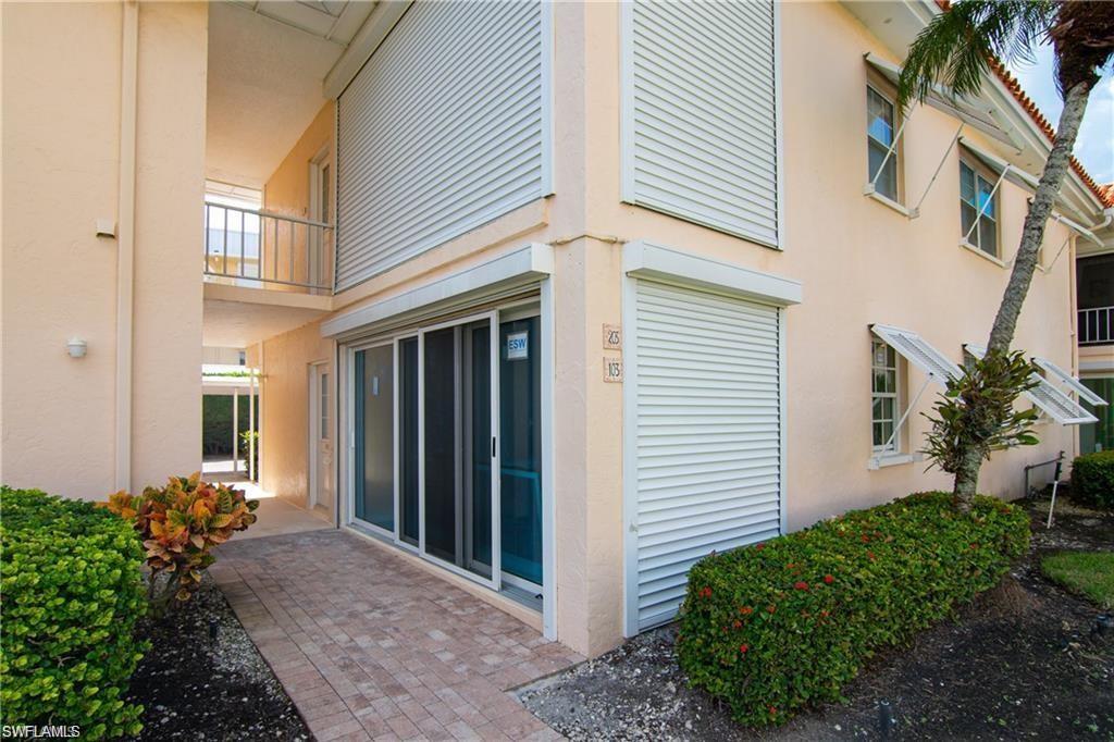 View of property exterior featuring stucco siding and a balcony