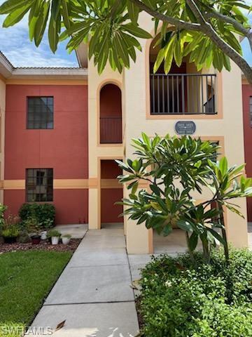 Property entrance with stucco siding