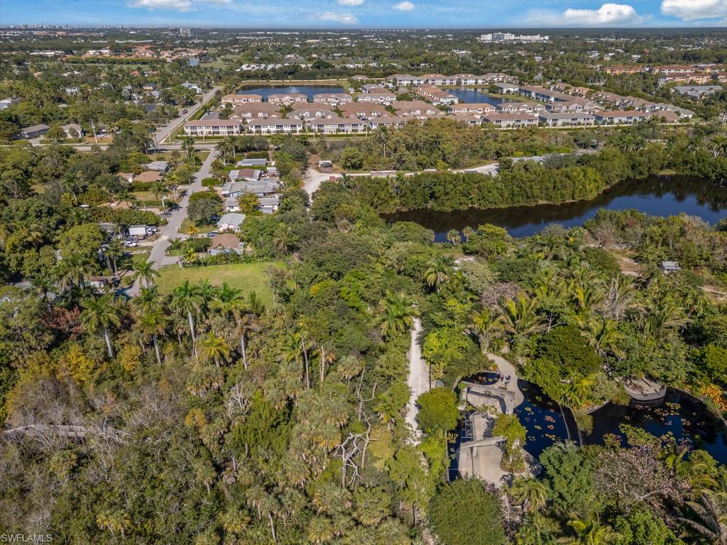 Aerial overview of property's location featuring a large body of water