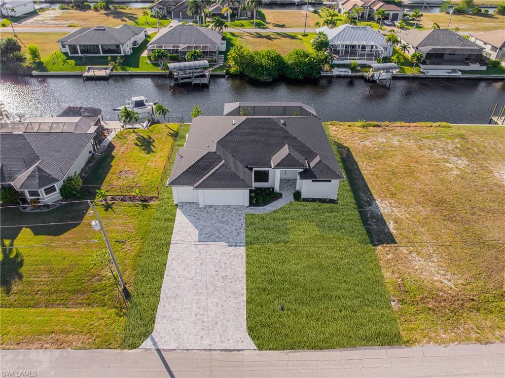 Aerial view of residential area with a nearby body of water