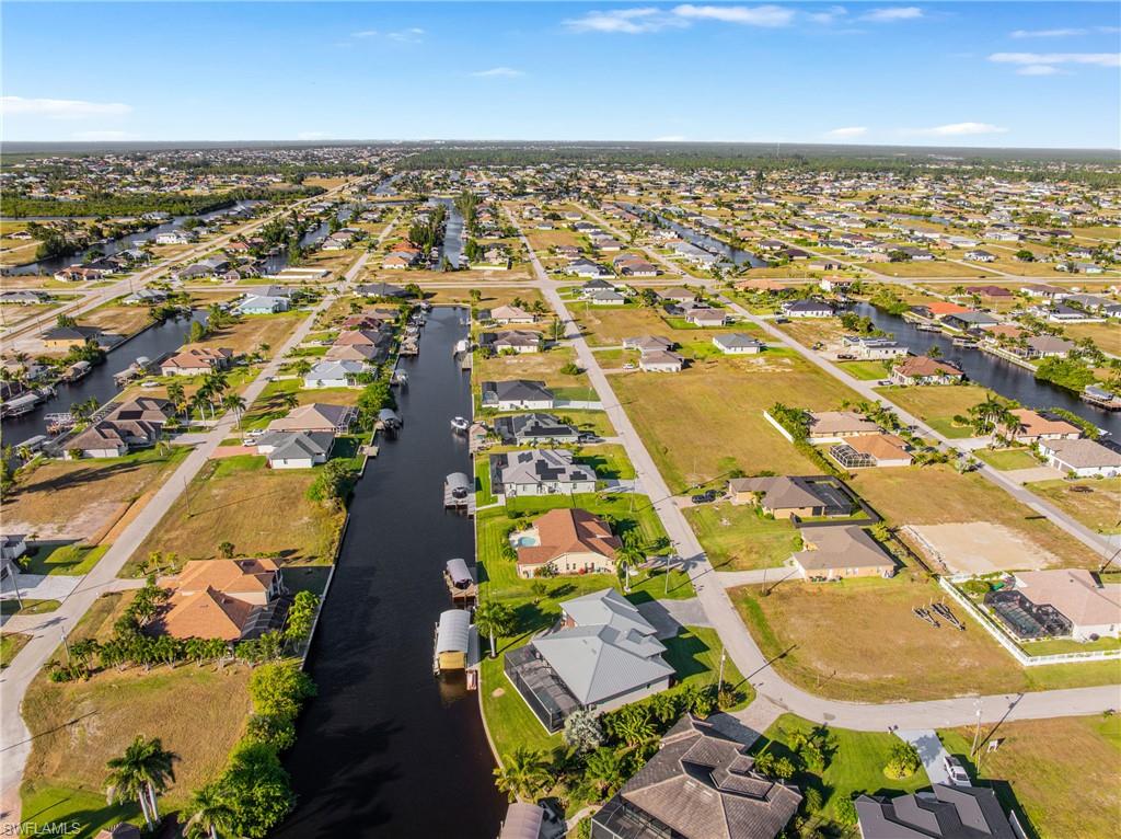 Aerial view of residential area with a large body of water