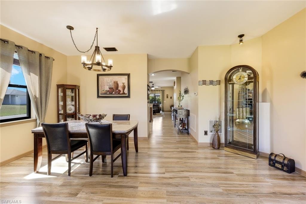 Office featuring light wood-type flooring and ceiling fan