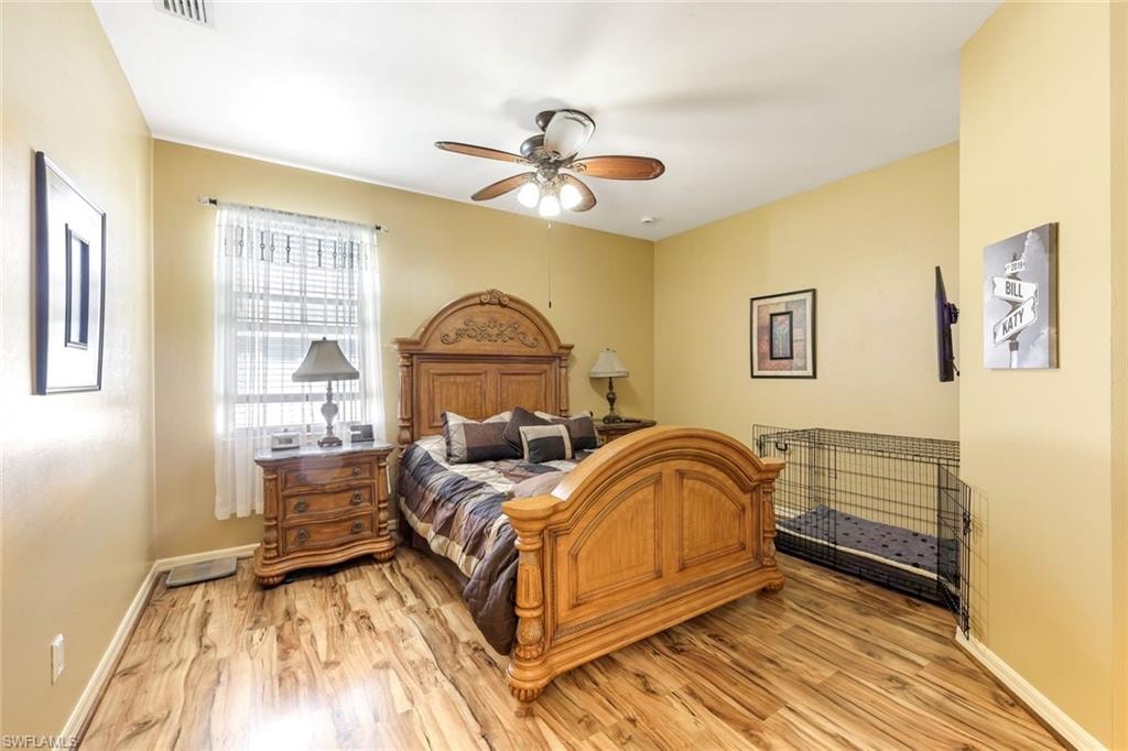 Full bathroom featuring a garden tub, double vanity, a stall shower, and recessed lighting