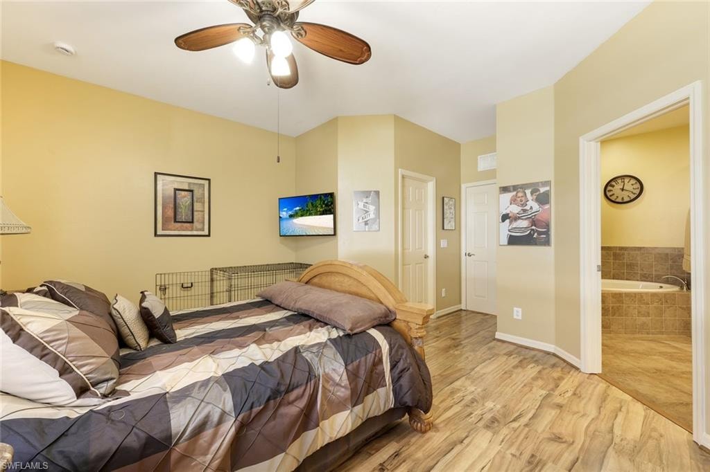 Bedroom featuring light wood-type flooring and a ceiling fan