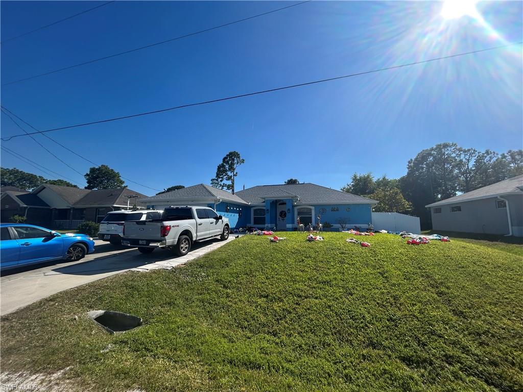 Single story home featuring driveway