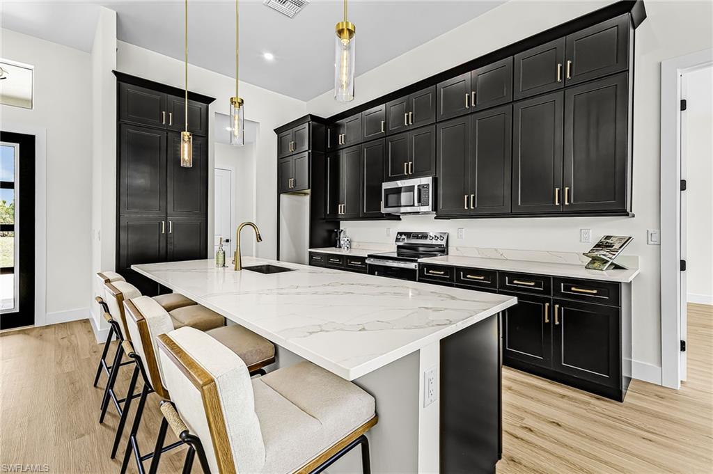 Furnished Kitchen with fun chairs