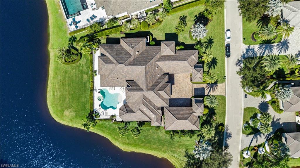 Bird's eye view of a large body of water and a pool area