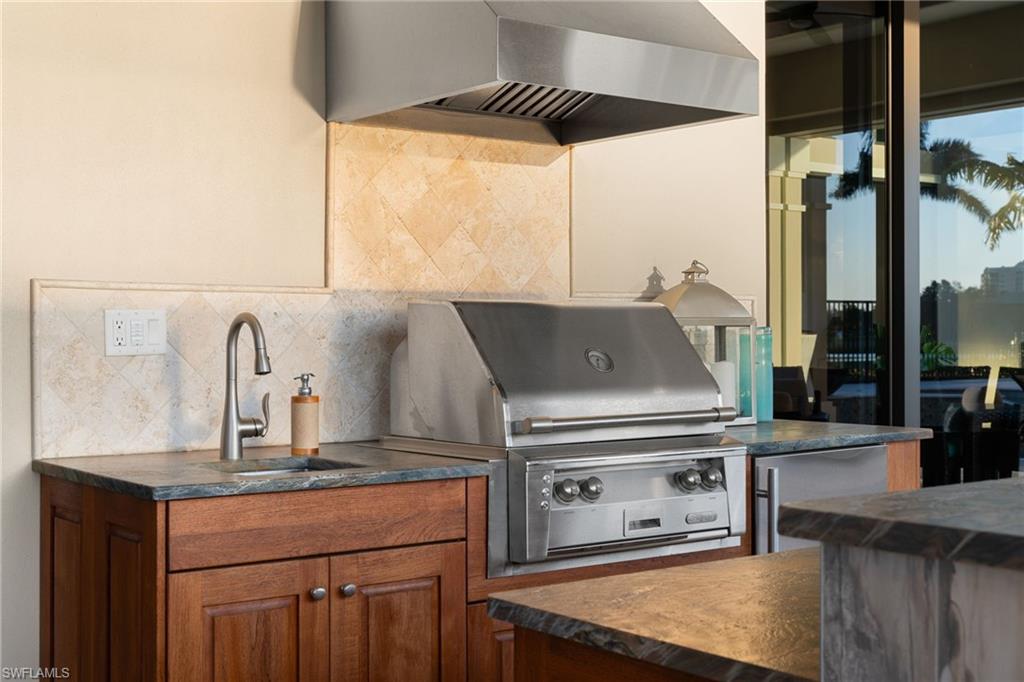 View of patio / terrace featuring an outdoor kitchen